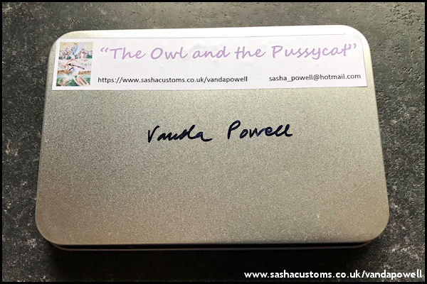 Display with Back of Tin